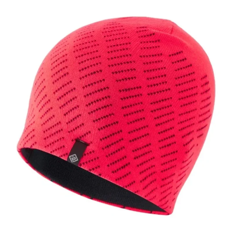 A bright red Ronhill running beanie with a subtle black geometric pattern and a black inner lining.