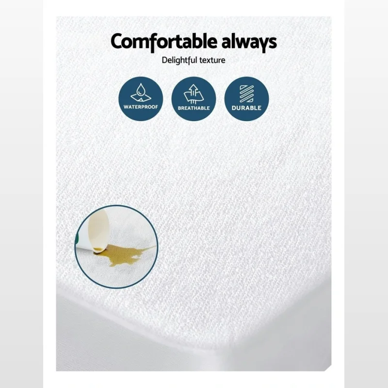 Close-up of a white queen mattress protector made of bamboo fabric, showing its texture and a demonstration of its waterproof quality.