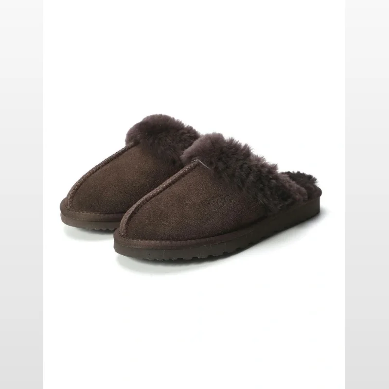 A pair of brown suede sheepskin slippers with fluffy wool lining, presented on a white background.