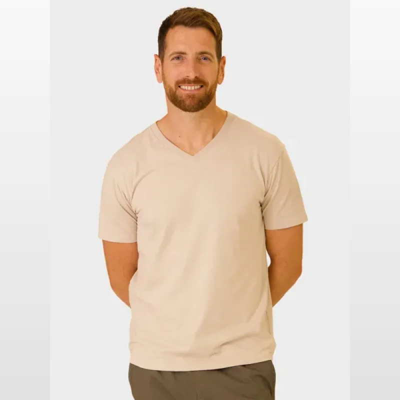 Man wearing a medium brown, short-sleeved, V-neck t-shirt made of cotton.