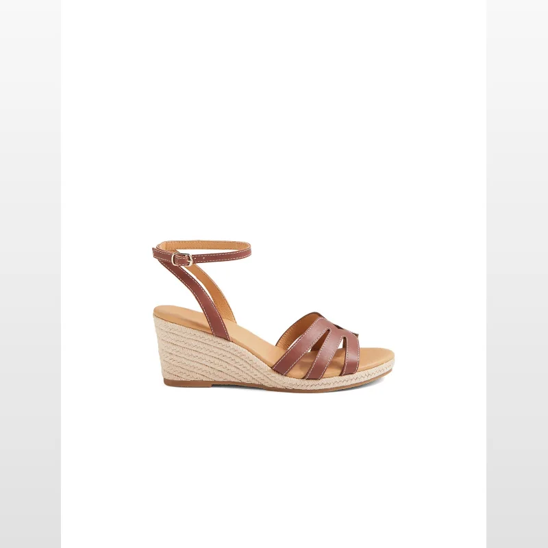 A single Diana Ferrari JESA women's espadrille wedge sandal in a tan leather finish with criss-cross straps and an ankle buckle, set against a white background.
