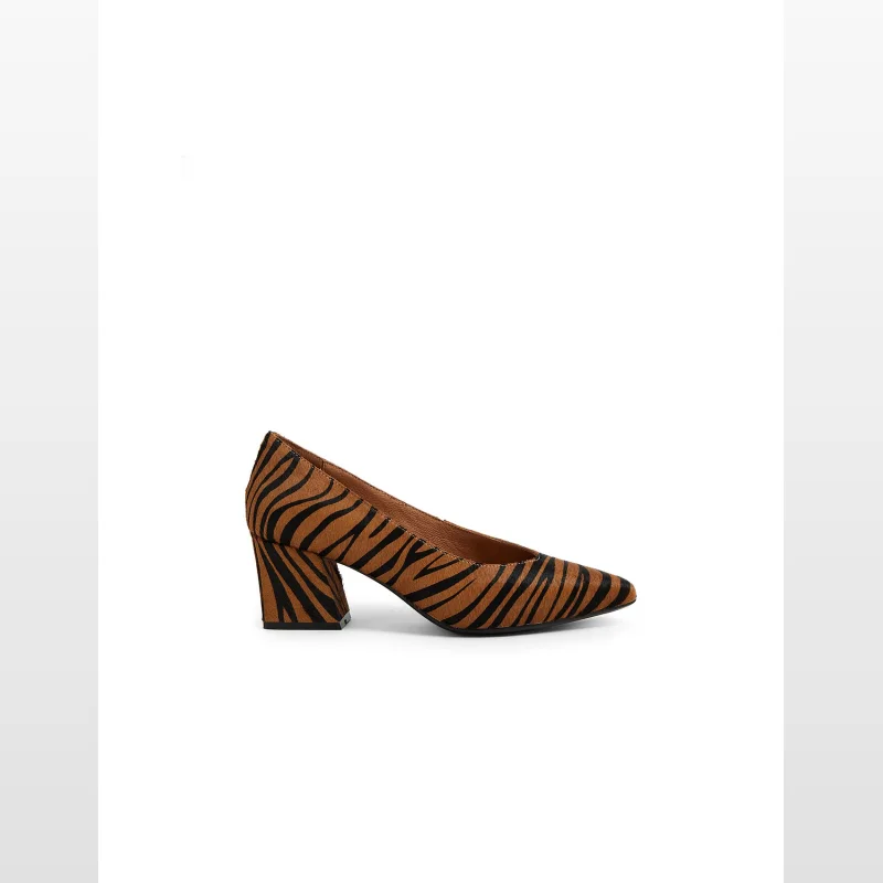 A tan and black tiger print pony block heel pump shoe with a pointed toe.