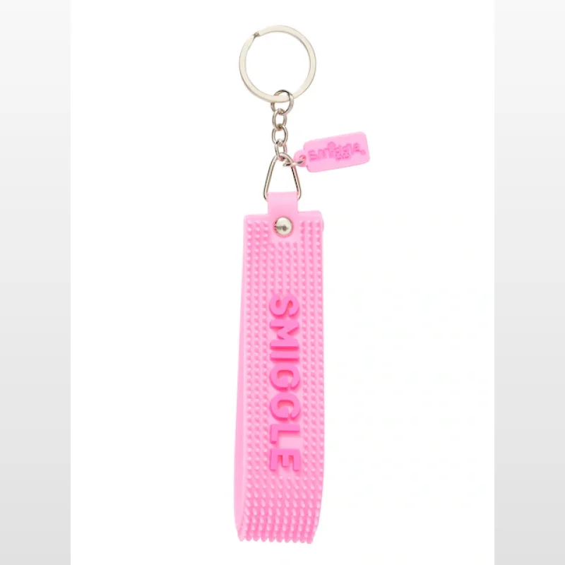 Pink Smiggle silicone tag keyring with sensory spikes and the Smiggle logo embossed on the tag and the word SMIGGLE on the strap.