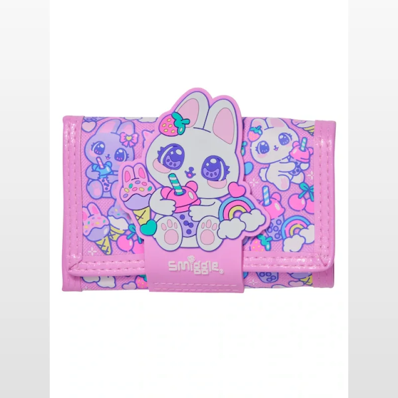 A pink Smiggle wallet featuring a large white bunny character badge with a strawberry on its head, surrounded by smaller kawaii-style bunnies, ice cream, and rainbows.