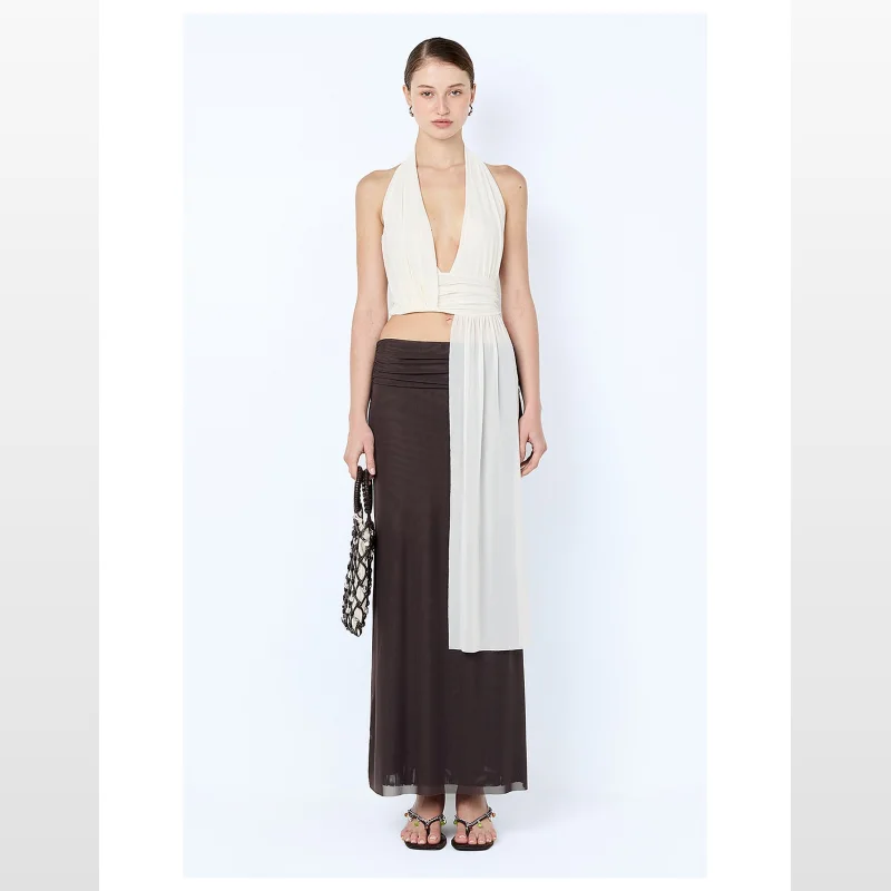 Model wearing the BEC + BRIDGE Eva Maxi Skirt in Dark Choc, a sophisticated mesh maxi skirt with a gathered waist and column silhouette.