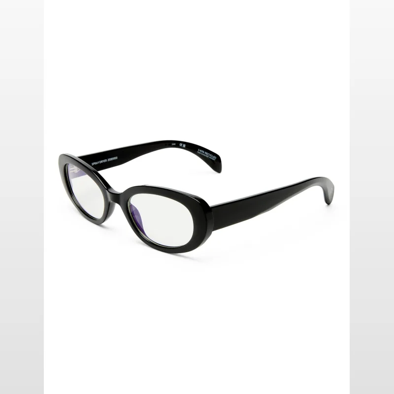 Black oval-shaped reading glasses with the brand name 'THE BOOK CLUB' and 'SPRAY DRYER' visible on the arm.