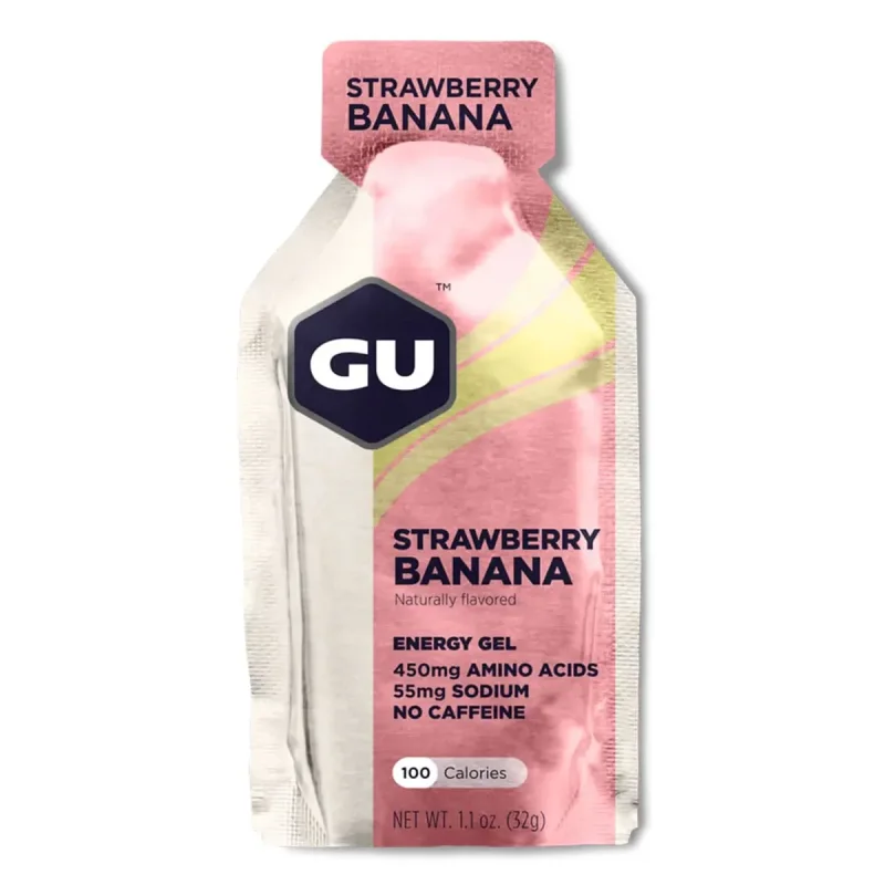 GU Energy Gel in Strawberry Banana flavour, a pink and yellow packet with the GU logo and nutritional information.