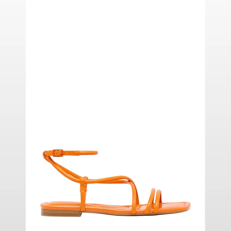 Orange Nine West Labrey flat sandal with thin straps and an ankle buckle closure, featuring a square open toe and a low flat heel.