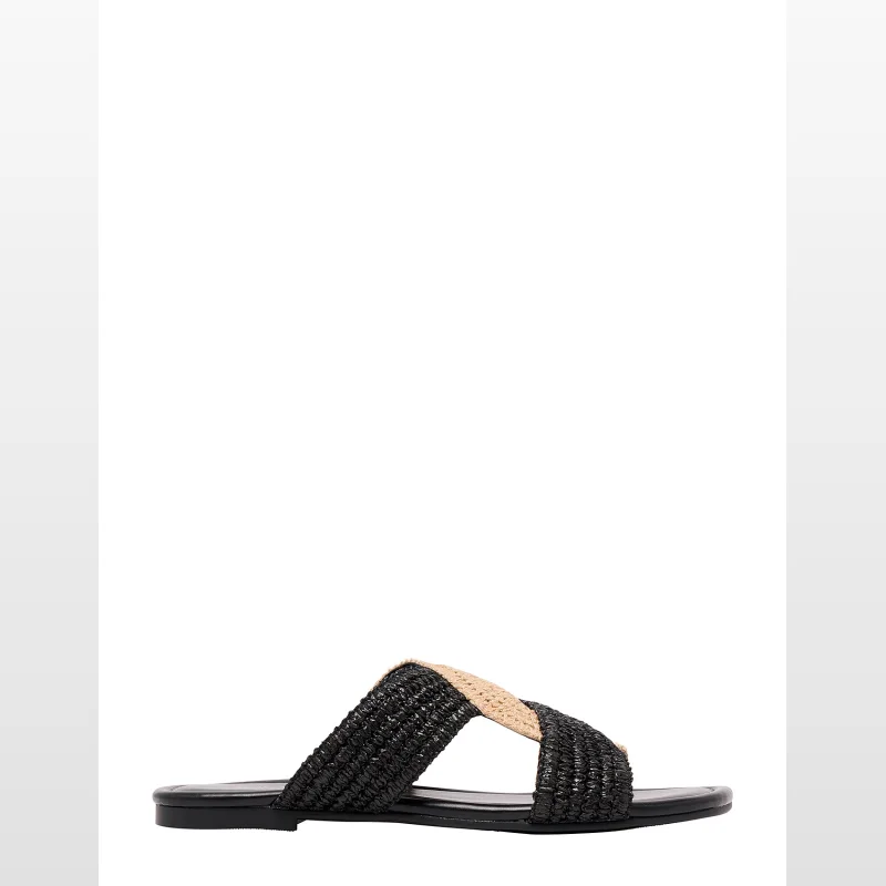 A black and tan woven crisscross strap flat sandal from Nine West.