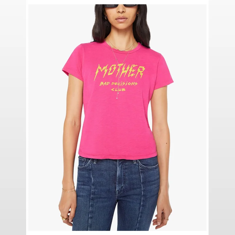 Woman wearing a hot pink MOTHER t-shirt with yellow 'MOTHER BAD DECISIONS CLUB' graphic text and blue denim jeans.