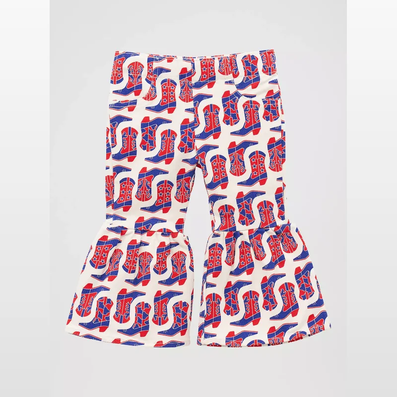 Cream coloured flared jeans for little girls with a repeating pattern of red and blue cowboy boots and stars.