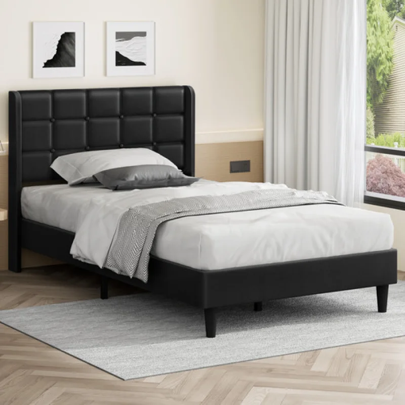 A black faux leather bed frame with a tufted headboard and a white mattress.