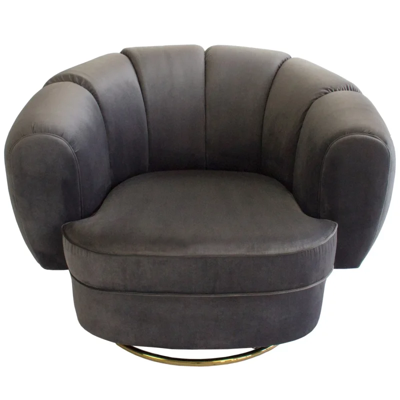 A dark grey velvet armchair with a scalloped back and a gold swivel base, isolated on a white background.