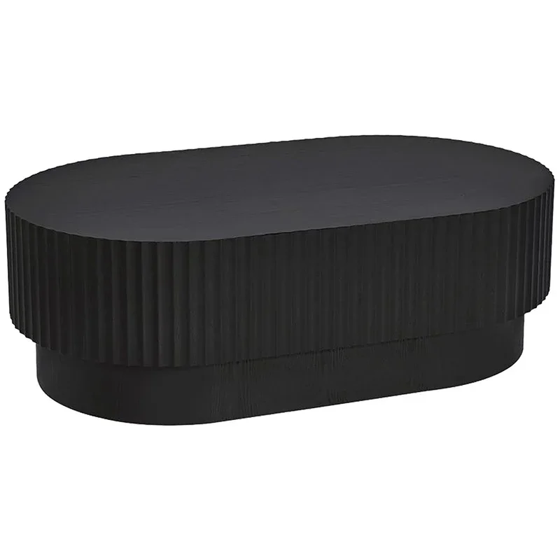 Black oval coffee table with a fluted textured base and a smooth top.
