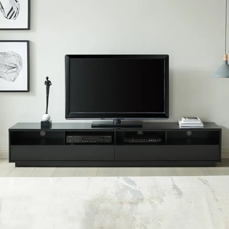 A sleek, black 200cm lowline TV unit with two drawers and open shelving, holding a television and entertainment devices.