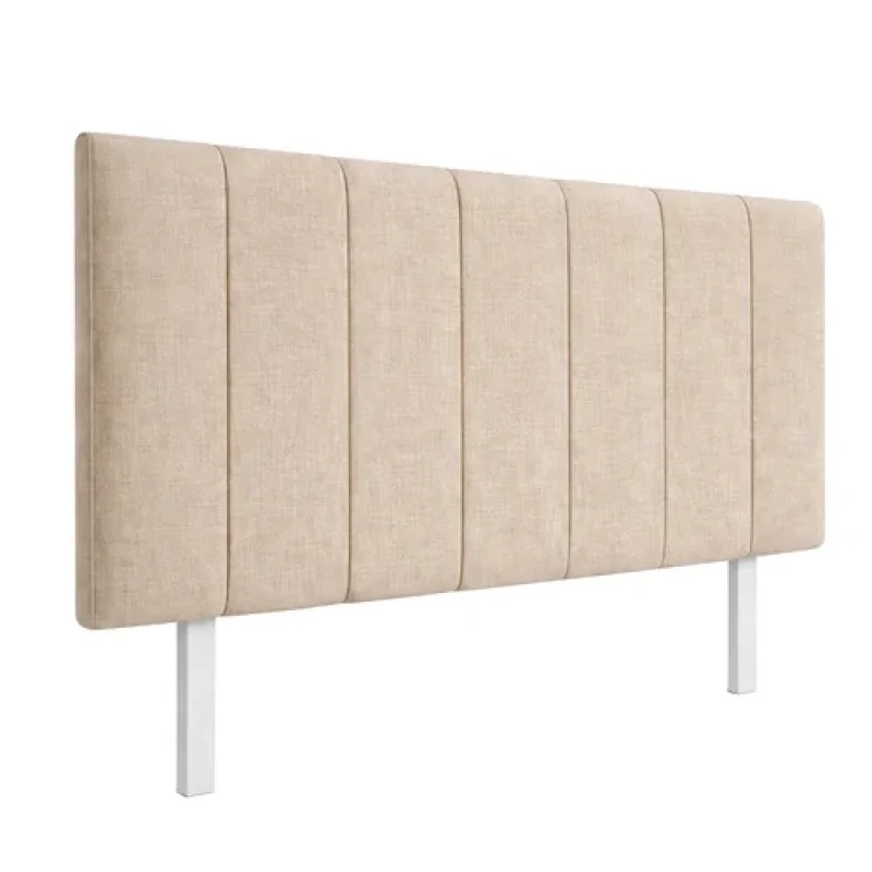 A beige upholstered super king bedhead with vertical channel tufting and white legs, shown against a white background.