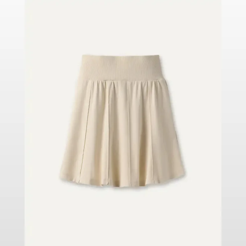 Cream-coloured flared mini skirt with a ribbed elastic waistband and subtle pleats.