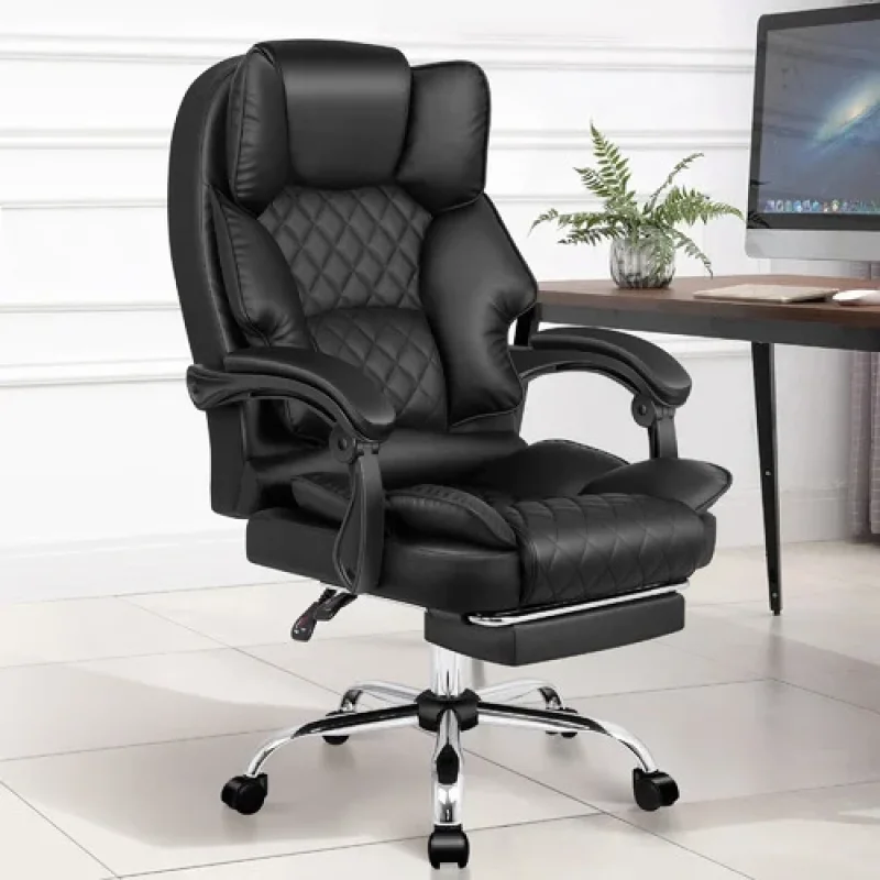 Black PU leather executive office chair with a diamond-stitched backrest, padded armrests, and an extendable footrest, shown next to a desk with a computer and a plant.