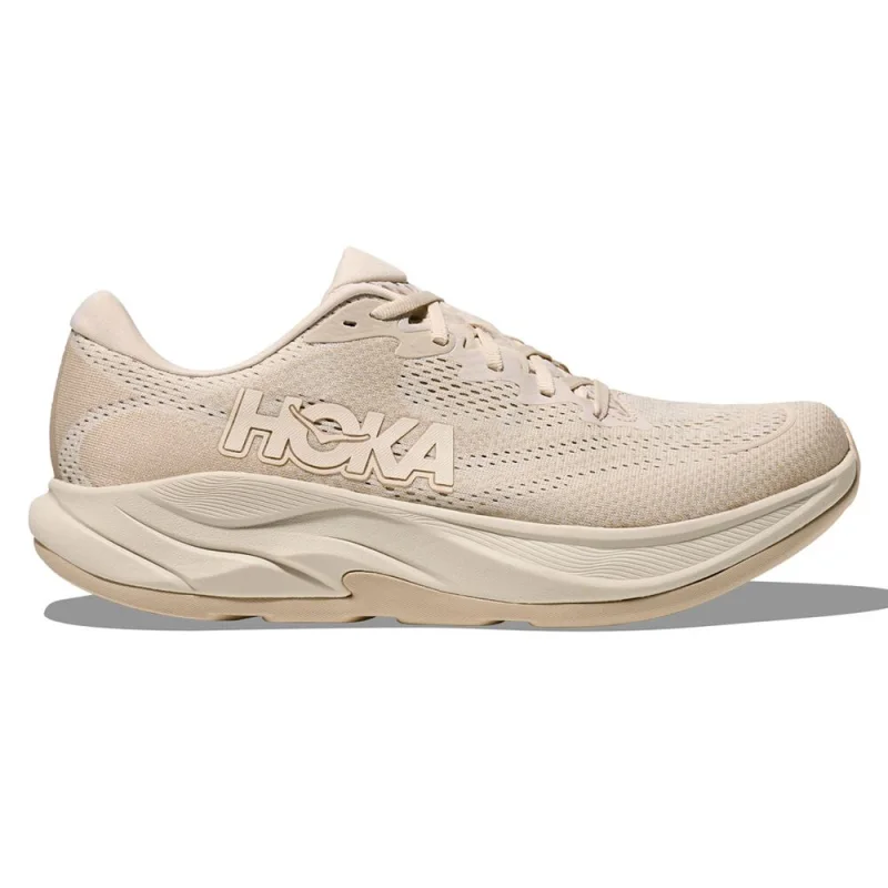 Side view of a single Hoka Rincon 4 men's running shoe in a light beige colour, featuring a breathable mesh upper and a thick, cushioned sole.