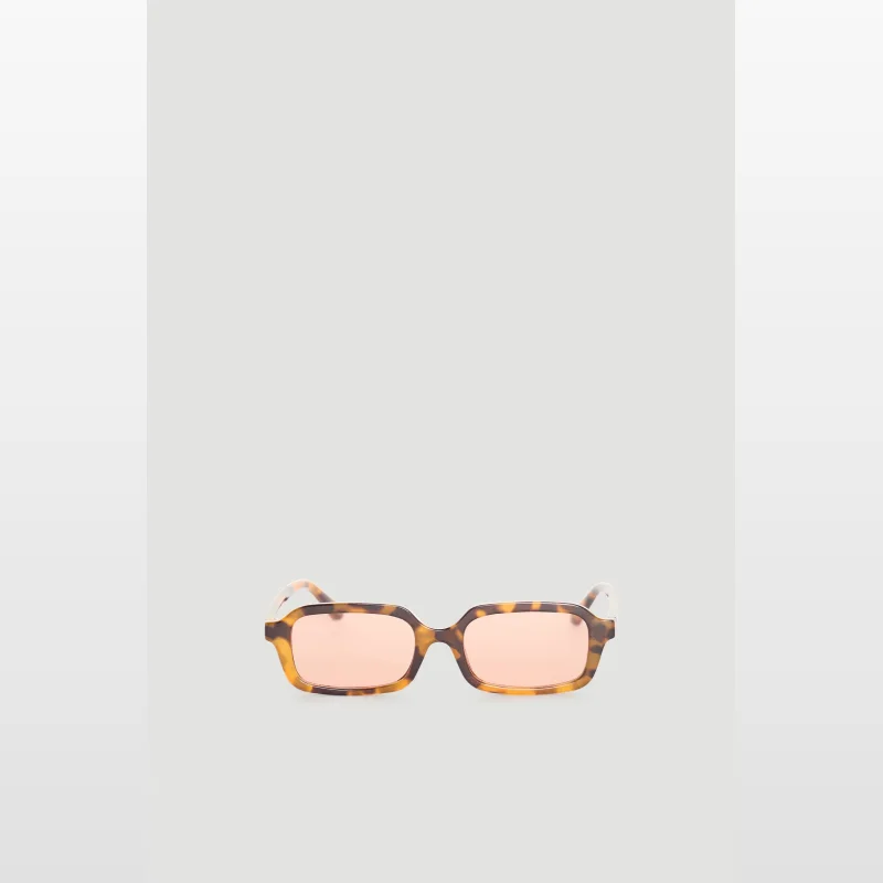 Decjuba Chelsea rectangle sunglasses with a tortoiseshell frame and light pink tinted lenses.