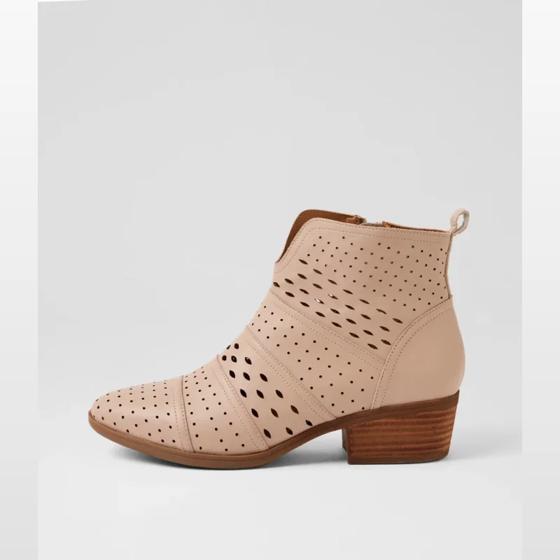 Side view of a tan leather ankle boot with laser-cut detailing and a stacked wooden heel.