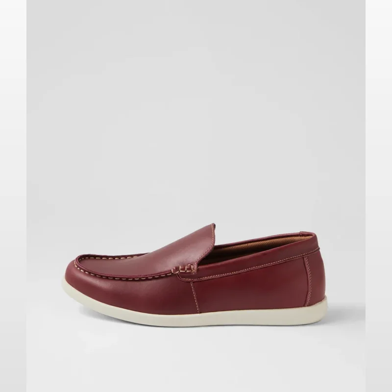 A side view of a single Reno Red Oiled Leather Flat Loafer Shoe from Williamsshoes, featuring a cream sole and white stitching.