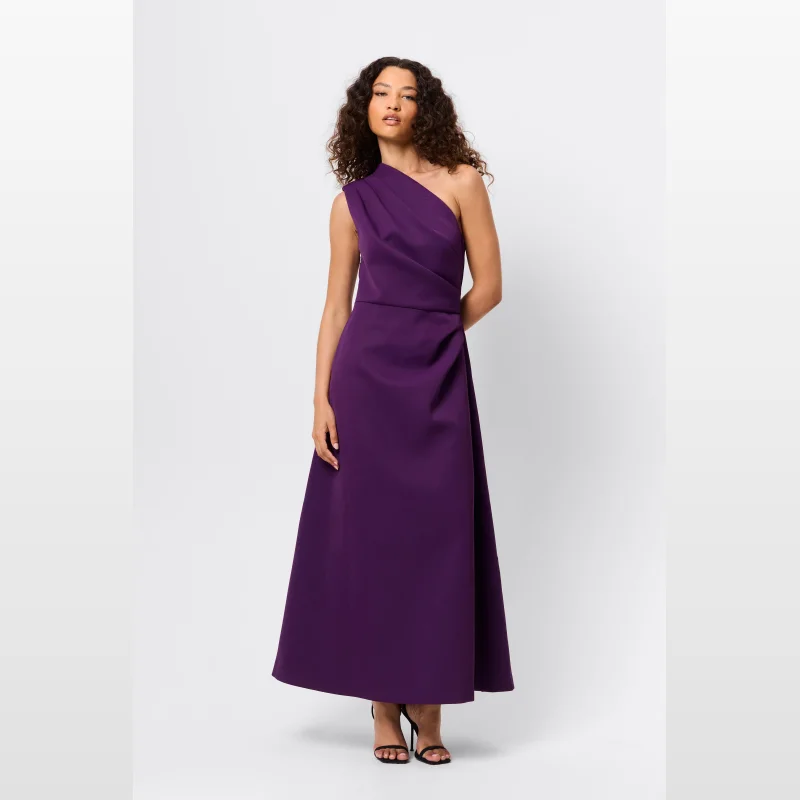 Woman wearing the Mossman Ignite Maxi Dress in purple, a one-shoulder, floor-length dress with tuck detailing and an A-line skirt.